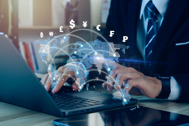 istock Currency exchange, money transfer.Businessman using mobile phone for digital banking, world currency via mobile app.FinTech financial technology, online banking, interbank payment, e-transaction concept. 1490941312