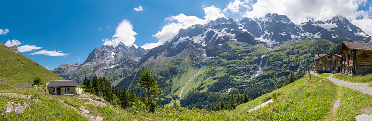 The panorama of Hineres Lauterbrunnental valley  with the peaks Grosshorn and Breithorn and Holdrifall waterfall.