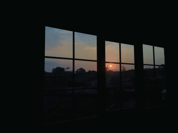 istock the silhouette of the true sun in the window and empty space 1490943756