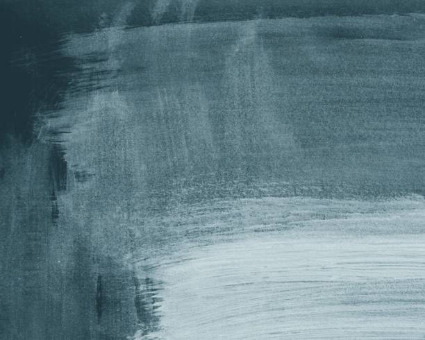 Three-dimensional painted brush featuring a gradient of gray and teal