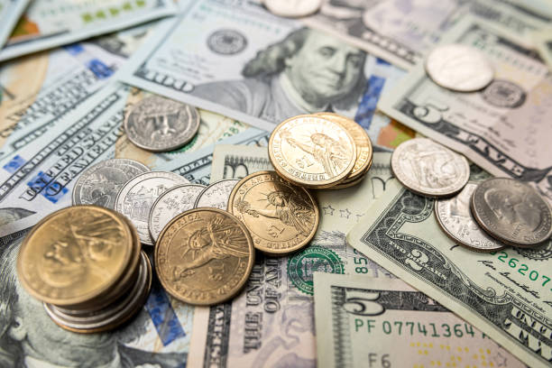 istock American money paper bills with coin cent 1490947018