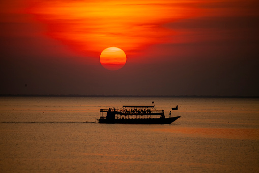 An amazing evening at Tonlé Sap, was taken and viewed from a rented boat