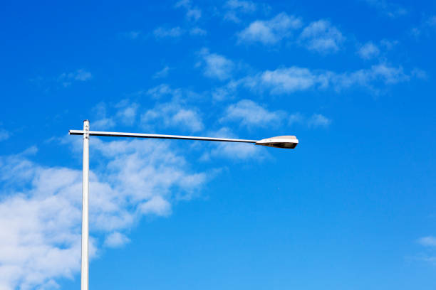 street light with arm across the road