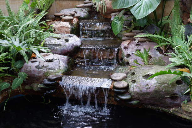 istock Mini waterfall decoration in front of the house. 1490949779