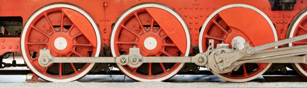 Big red wheels of a steam locomotive stock photo