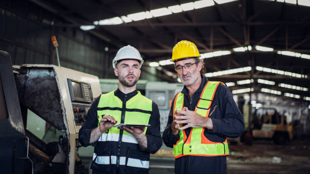 istock Team engineer are working in the factory. Mechanical technicians are maintaining the engine. 1490955317