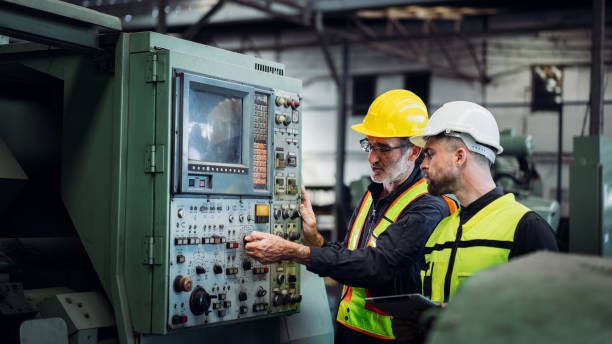istock Team engineer are working in the factory. Mechanical technicians are maintaining the engine. 1490956506