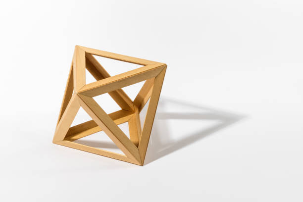 istock Wooden octahedron on gray background 1490957594
