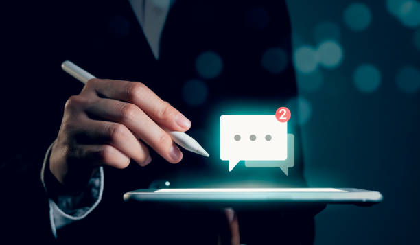 istock Businessman hand using smartphone and shows a digital screen of new messages notifications. 1490959276