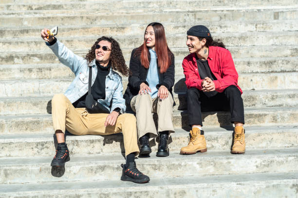 istock Young friends taking a selfie on a staircase at street 1490959521