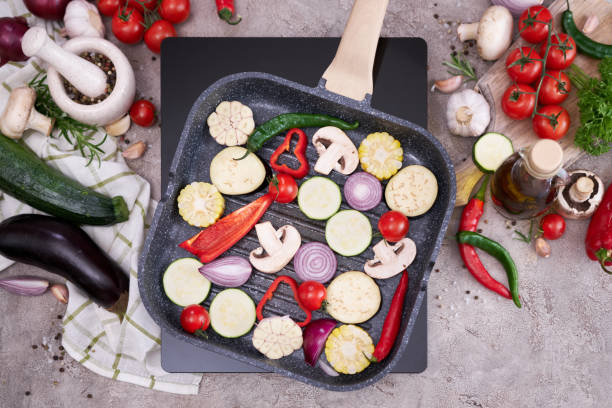 istock Grilled vegetables on grill pan at domestic kitchen 1490960184
