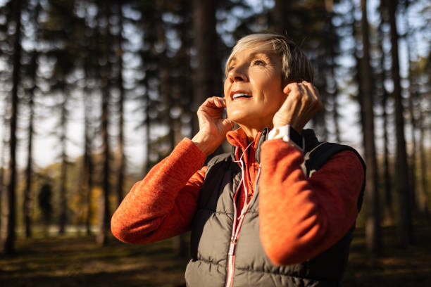 istock Running in nature with headphones 1490960346