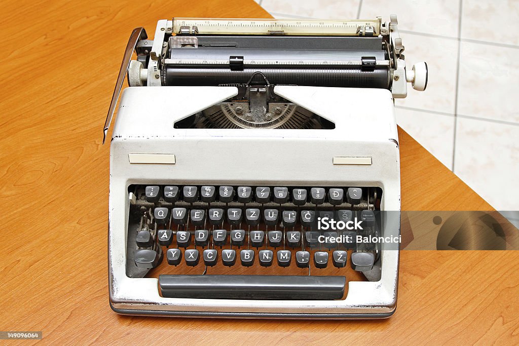 Typewriter Retro style typewriter at office desk Desk Stock Photo