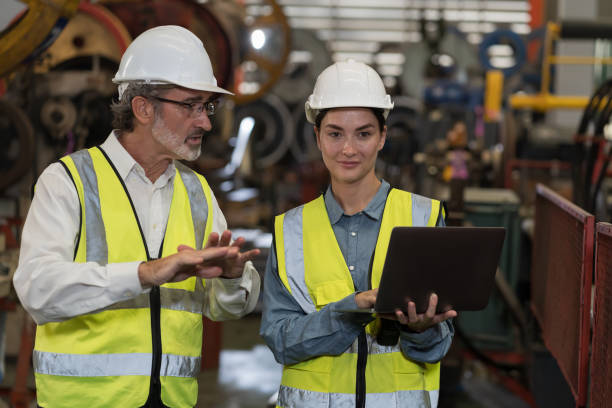 istock Group of engineer workers checking, repair and maintenance conveyor belt machine at manufacturing production lines in factory during manufacturing process 1490963416