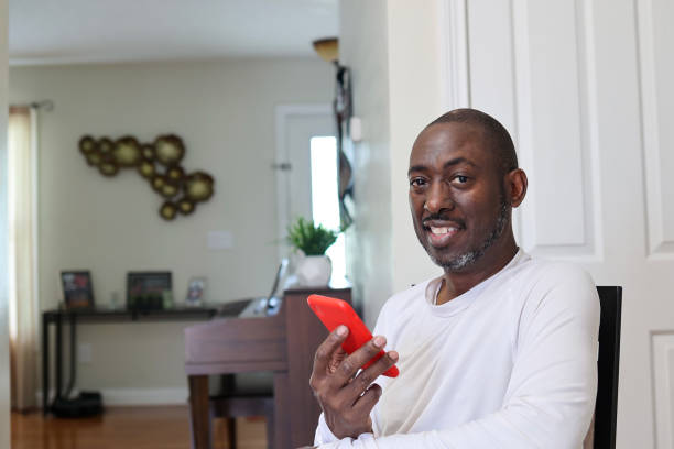 istock A portrait of a black man talking on a mobile phone 1490964314