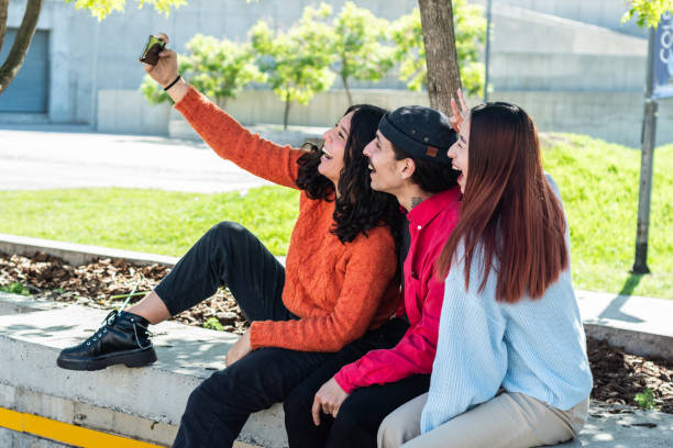 istock Young friends taking a selfie at street 1490965637