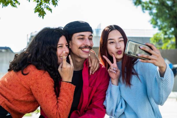 istock Young friends taking a selfie at street 1490965641