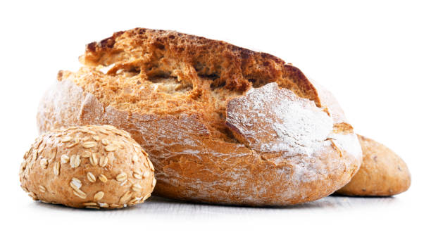 istock A loaf of bread and rolls isolated on white background 1490973356