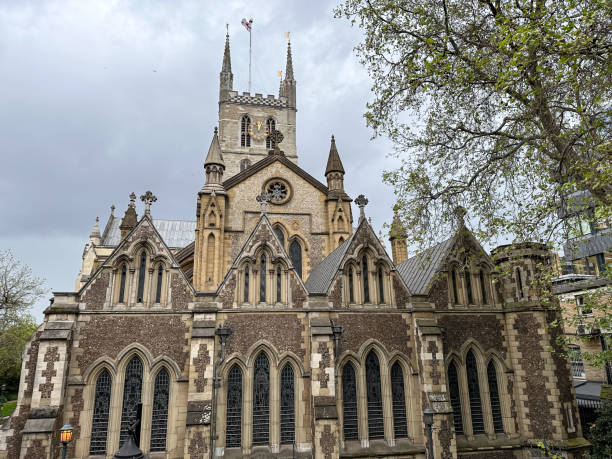 Southwark Cathedral view in London London, England. Southwark cathedral view from Borough high street. Medieval cathedral on the south bank of the Thames in London southwark stock pictures, royalty-free photos & images