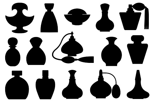 Collection of different perfume bottles isolated on white
