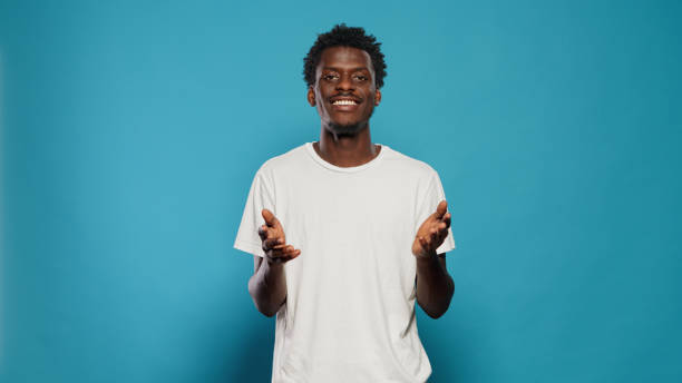 istock Young adult talking and doing hand gestures on camera 1490985584