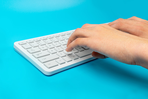 Using White Wireless Keyboard, Hands on New Grey Keyboard, Working, Printing on Copmputer Closeup