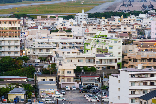 This photo shows U.S. Futenma Airfield in Ginowan, Okinawa, shot on January 5, 2023. The U.S. Futenma Airfield is located right next to the city of Ginowan. In this photo, it's seen that some aircrafts are parked at the U.S. Futenma Airfield.