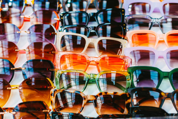 istock Selection of modern fashionable sunglasses on display 1490987928