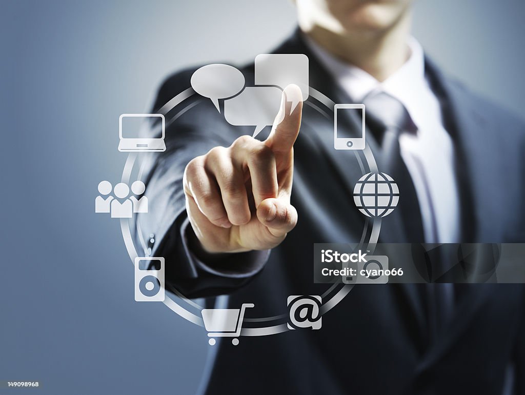 touchscreen interface Businessman pressing virtual icons Business Stock Photo