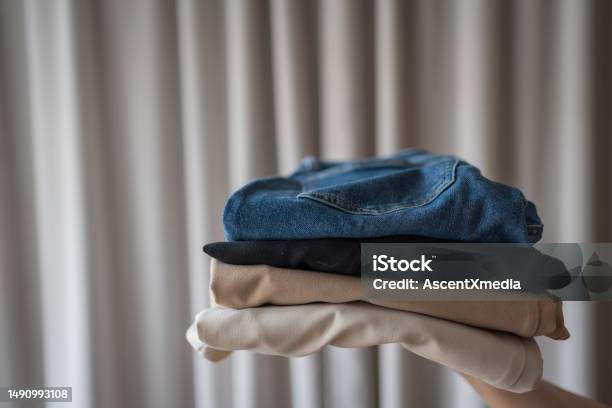 Stack Of Clothing And Curtain Stock Photo - Download Image Now - Backgrounds, Beige, Black Color
