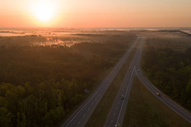 istock A highway with a sunset in the background 1490995343