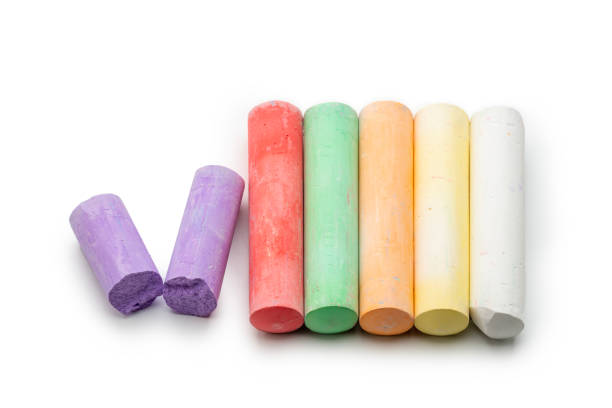 istock Concept kids: Pieces of colored chalk on a white background 1490996362