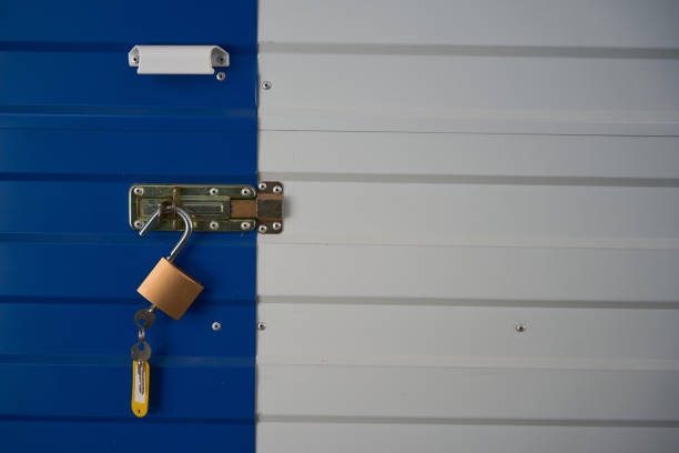 istock Close-up of lock from a self storage unit in a warehouse 1491006914