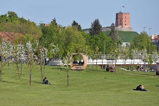 Vilnius, May 10: view to city recreation zone at Neris river and Gedimino castle on May 10, 2023 in Vilnius, Lithuania. Vilnius city is capital of Lithuania