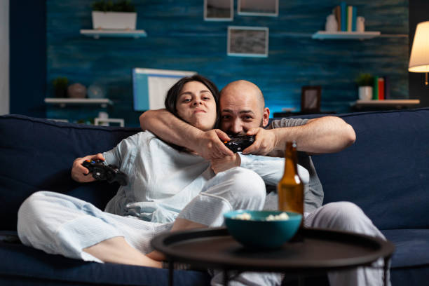 istock Determinated enthusiastic couple winning video games 1491018124