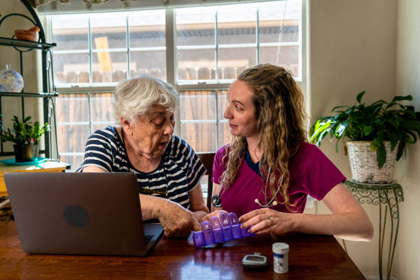 istock The young nurse is explaining the elderly woman's daily medications in a clear and concise manner, ensuring that the woman understands the purpose and dosage of each medication. 1491023402