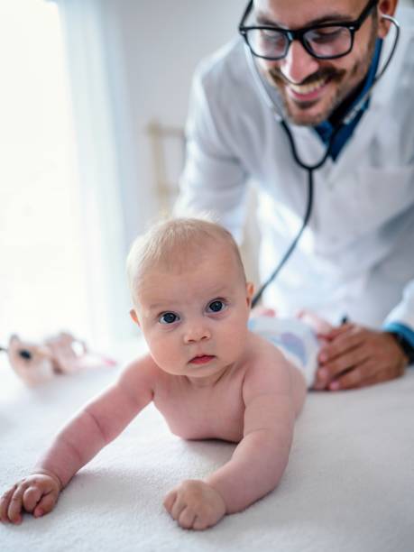 istock A smiling pediatrician holding a stethoscope to a baby 1491026087