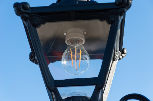 Street lamp with incandescent lamp inside