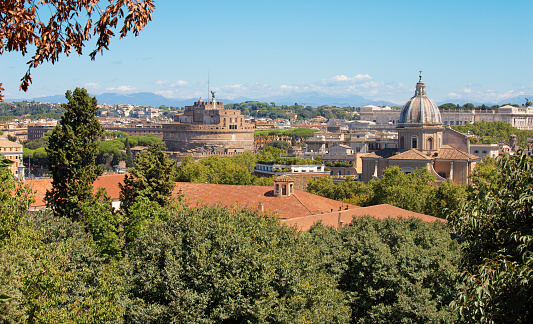 Rome - The cityscape with the Angels bridge and the cupola of church Basilica di San Giovanni Battista dei Fiorentini.