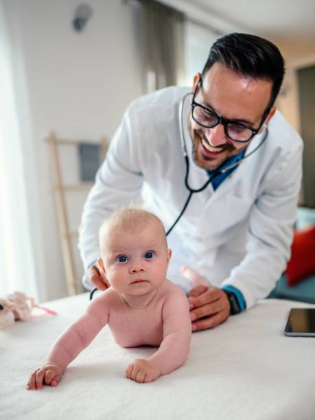 istock A smiling pediatrician holding a stethoscope to a baby 1491028081