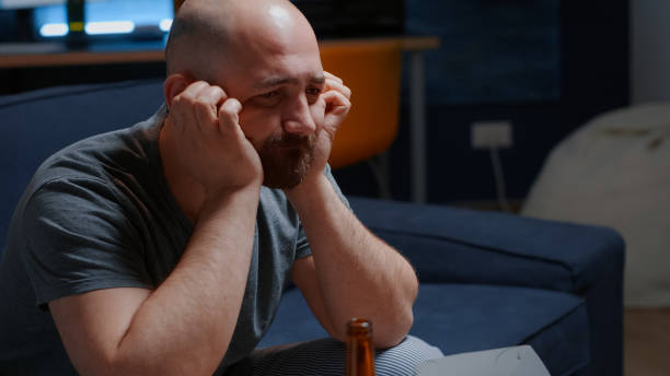 istock Traumatised, frustrated stressed depressed man suffering from break up crying 1491028722