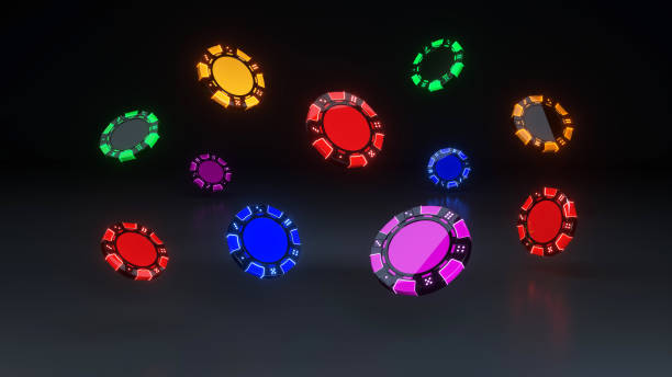 istock Poker chips in different positions. Yellow, Red, blue, and green chips are isolated on Black background 1491036484