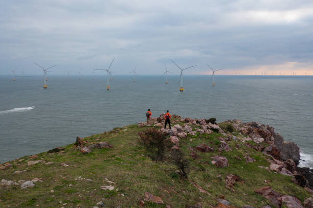 istock Offshore wind farm and seaside electrician 1491037723