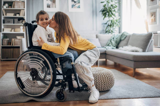 istock Mom kissing her young daughter 1491038412