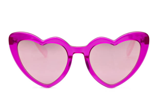 istock Pink heart shaped sunglasses with heart shape isolated on white background 1491039539