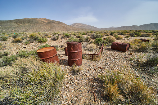 Old rusted cans dumped in the Nevada desert long ago