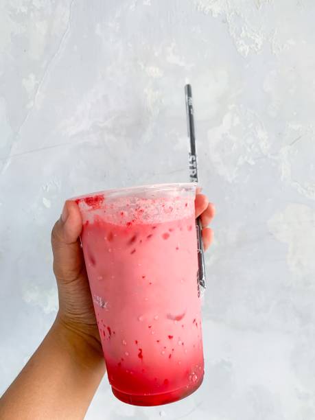 istock Hand holding iced red velvet milk 1491042017