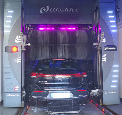 Itterbeck, Nov 25 2022 - An all electric Mercedes Benz EQA 250+  is washed in a car wash from Washtec