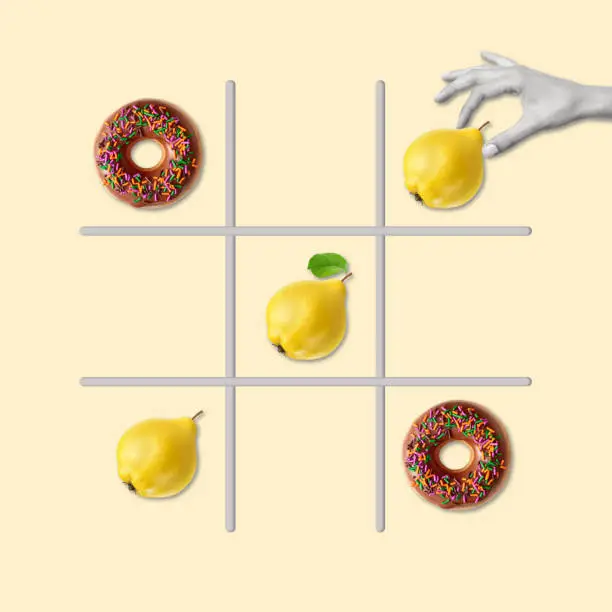 Contemporary art collage of hand playing in tic tac toe or noughts and crosses game with pear and donut. Healthy nutrition concept. Choosing the right and healthy food. Modern design.
