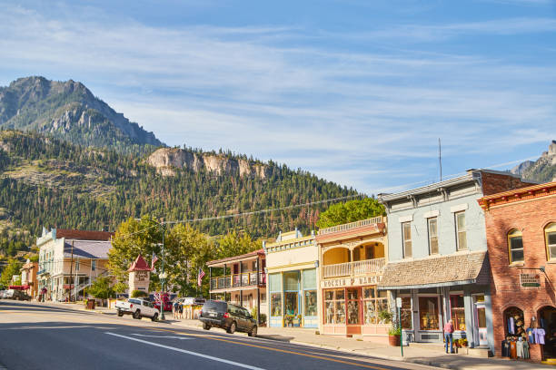 istock Road of small mountain town with shops 1491043714